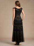 Karena Floor Length Dress Black - Order In back view with intricate beading and design, showcasing elegant style.