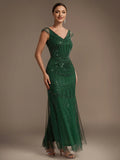 Karena Dress Forest Green - Order In featuring cap sleeves and sequined detailing, fitted design perfect for special occasions.