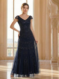 Karena Dress Navy Blue - Order In, featuring cap sleeves, sequined design, fitted to the thigh, elegant floor-length style.