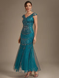 Karena Floor Length Dress Teal - Order In showcasing a fitted design with cap sleeves and sequins for elegant occasions.