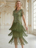 Roxy Knee Length Dress Moss - Order In showcasing a flapper style with sequins and fringe design in a luxurious setting.