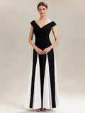 Tonya Dress Black White - Order In featuring elegant cap sleeves and a flattering V-neck design.
