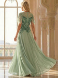 Whitney Dress Fern Floor Length - Order In showcasing a beautiful back view with sequined top and flowing chiffon skirt.