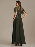 Whitney Dress Juniper Floor Length - Order In, showcasing the elegant back design and flowy silhouette.