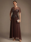 Whitney Dress Milk Chocolate - Order In elegant floor-length dress with detailed sequin design.