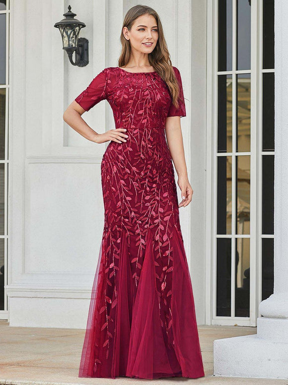 burgundy formal dress with tulle overlay and leaf design