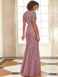 orchid pink formal dress with tulle overlay and leaf design